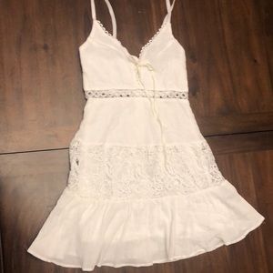 White flowy summertime mini dress. Size Small. Length 34” p2p 14 NWOT